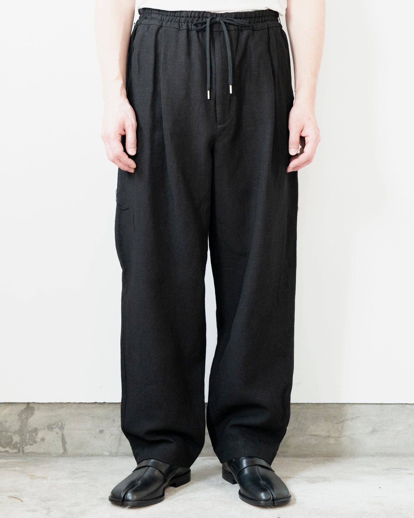 ROUGH LINEN CANVAS RELAXED TROUSERS