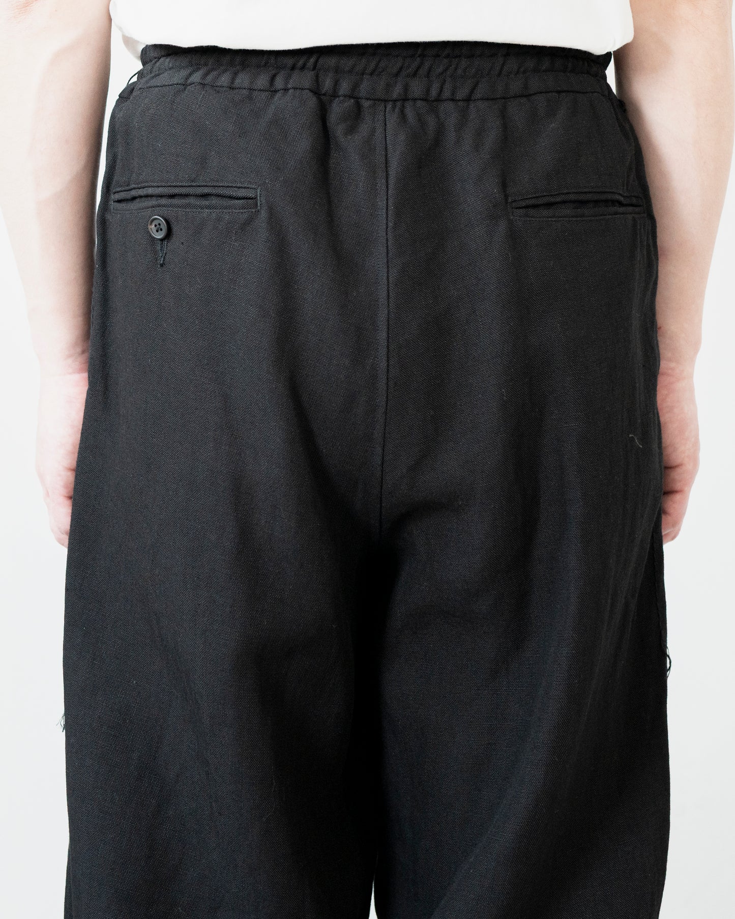 ROUGH LINEN CANVAS RELAXED TROUSERS