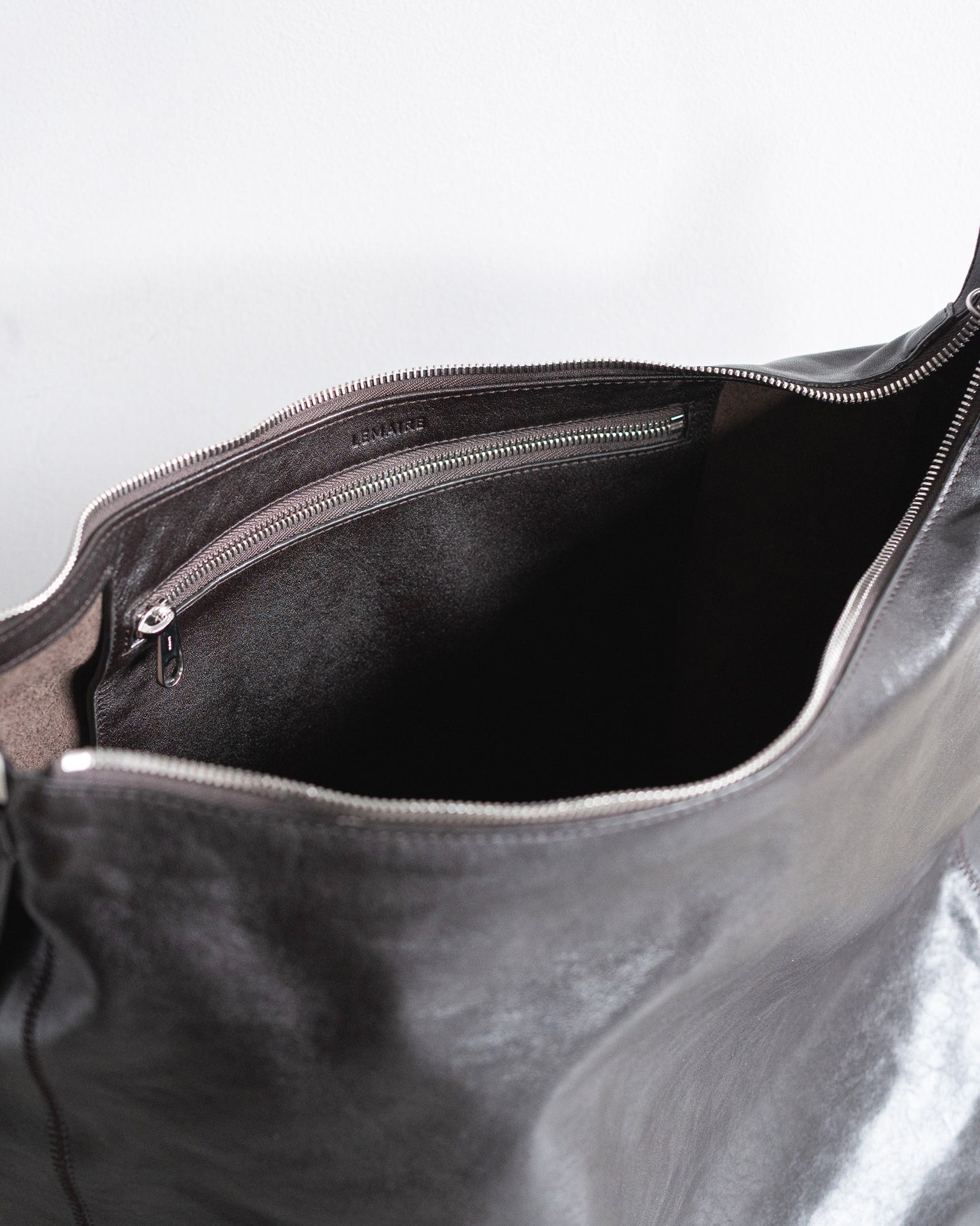 BELTED HOBO BAG IN LEATHER