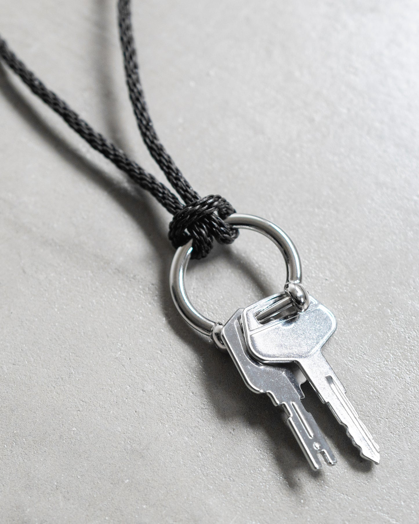 BRAIDED LEATHER KEYRING NECKLACE